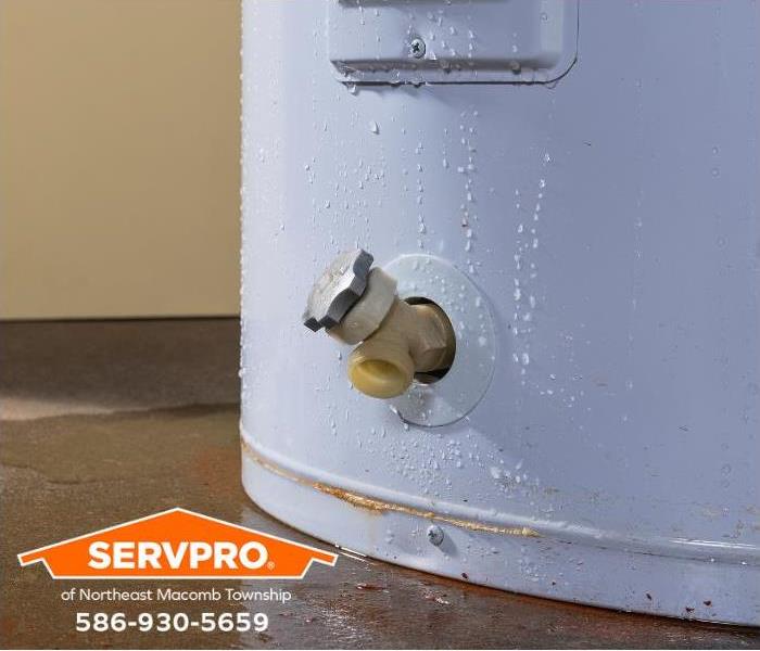 A leaking water heater is shown.